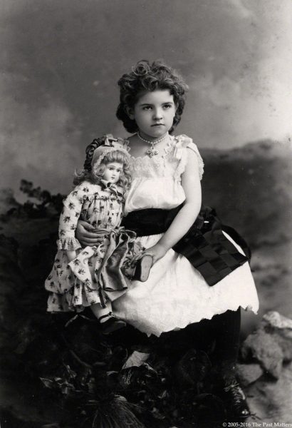Beautiful little girl with her French bisque Jumeau doll circa 1886